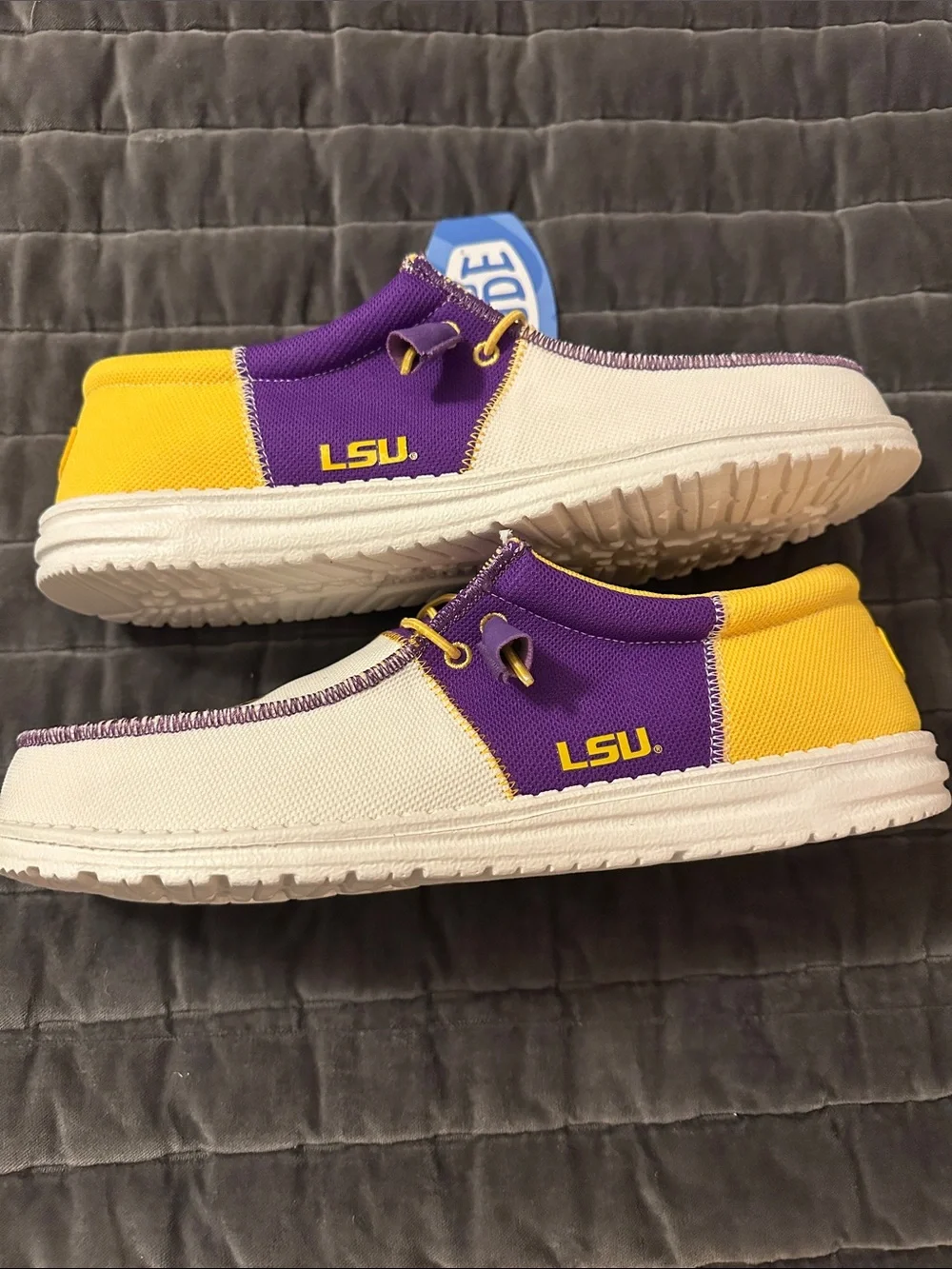 Hey Dude Men’s LSU Canvas Slip-On Loafers with Purple & Yellow Accents
